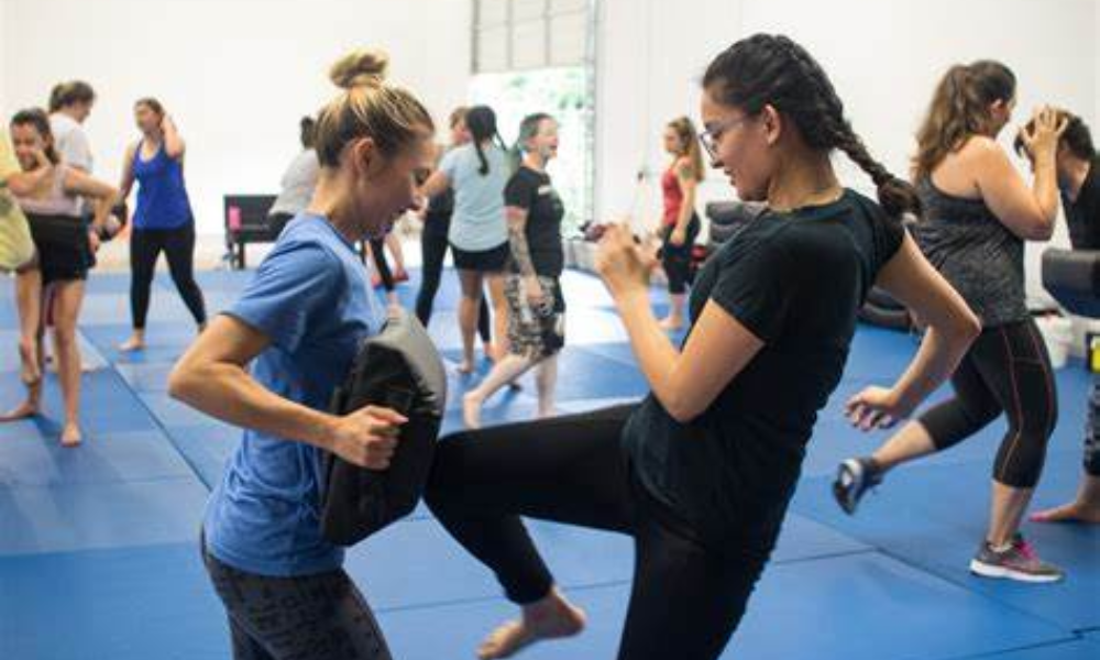 Women training in their self-defense classes to show readers a glimpse of what those classes are like.