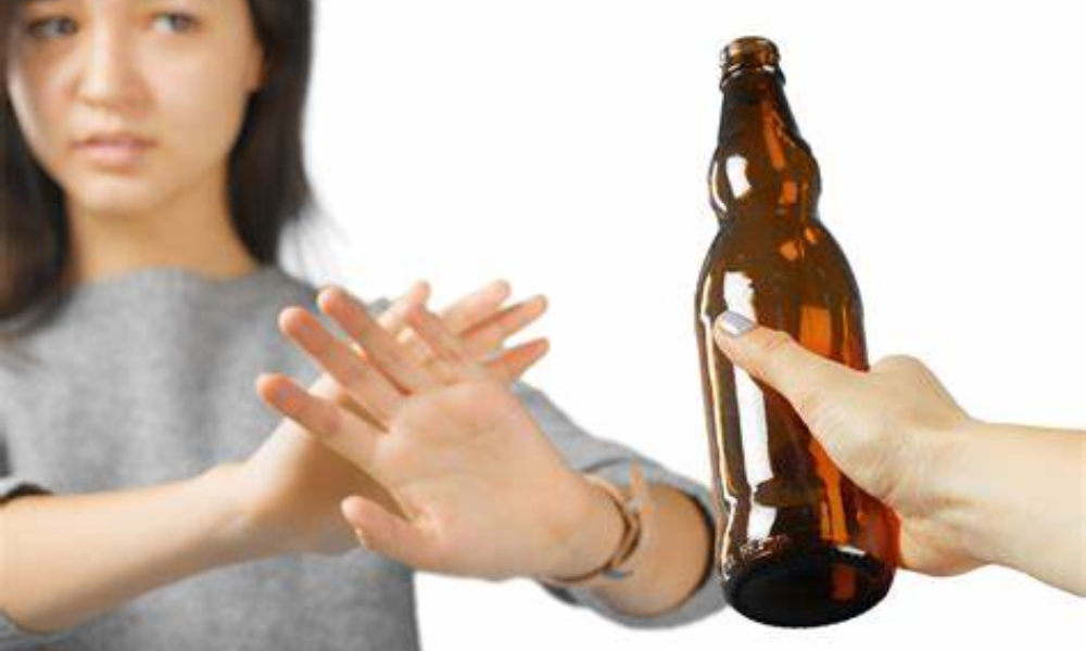 A women saying no to alcohol for the sake of her own safety.