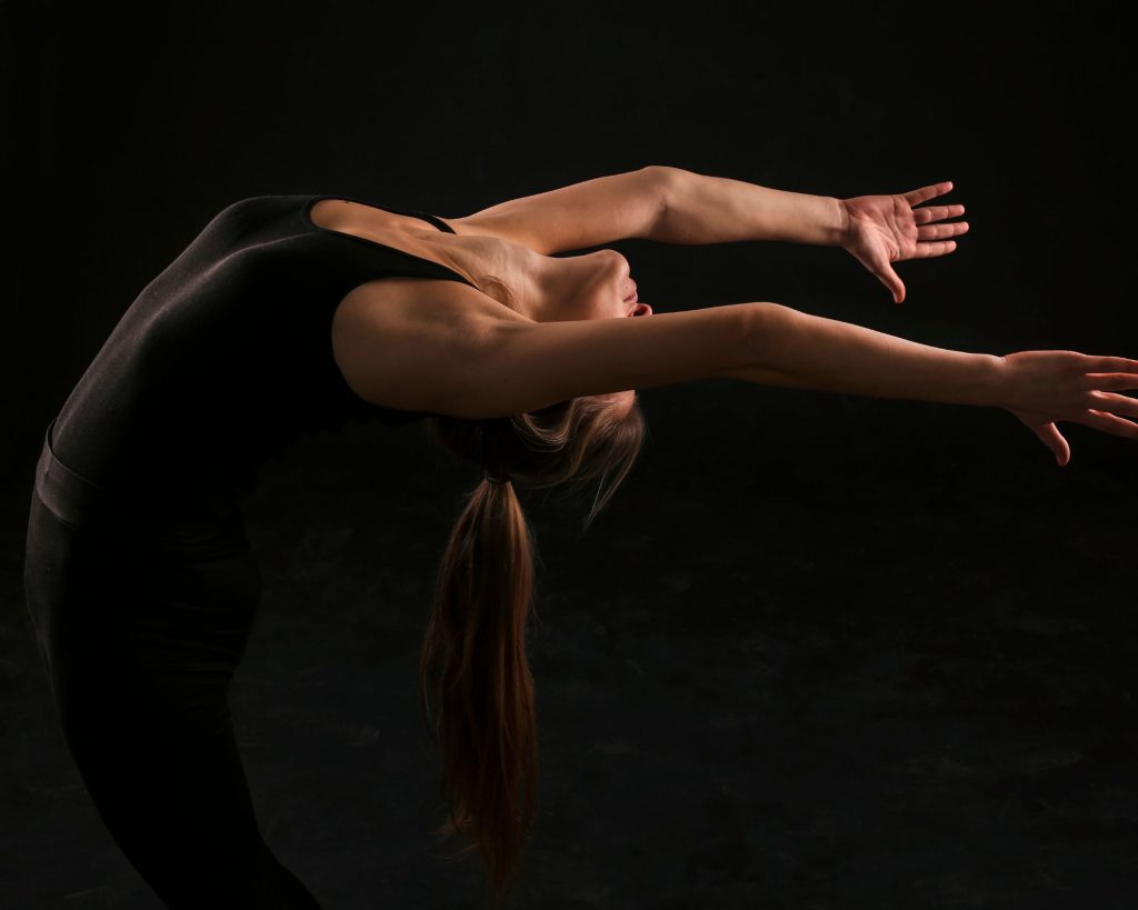 A woman practicing her flexibility.