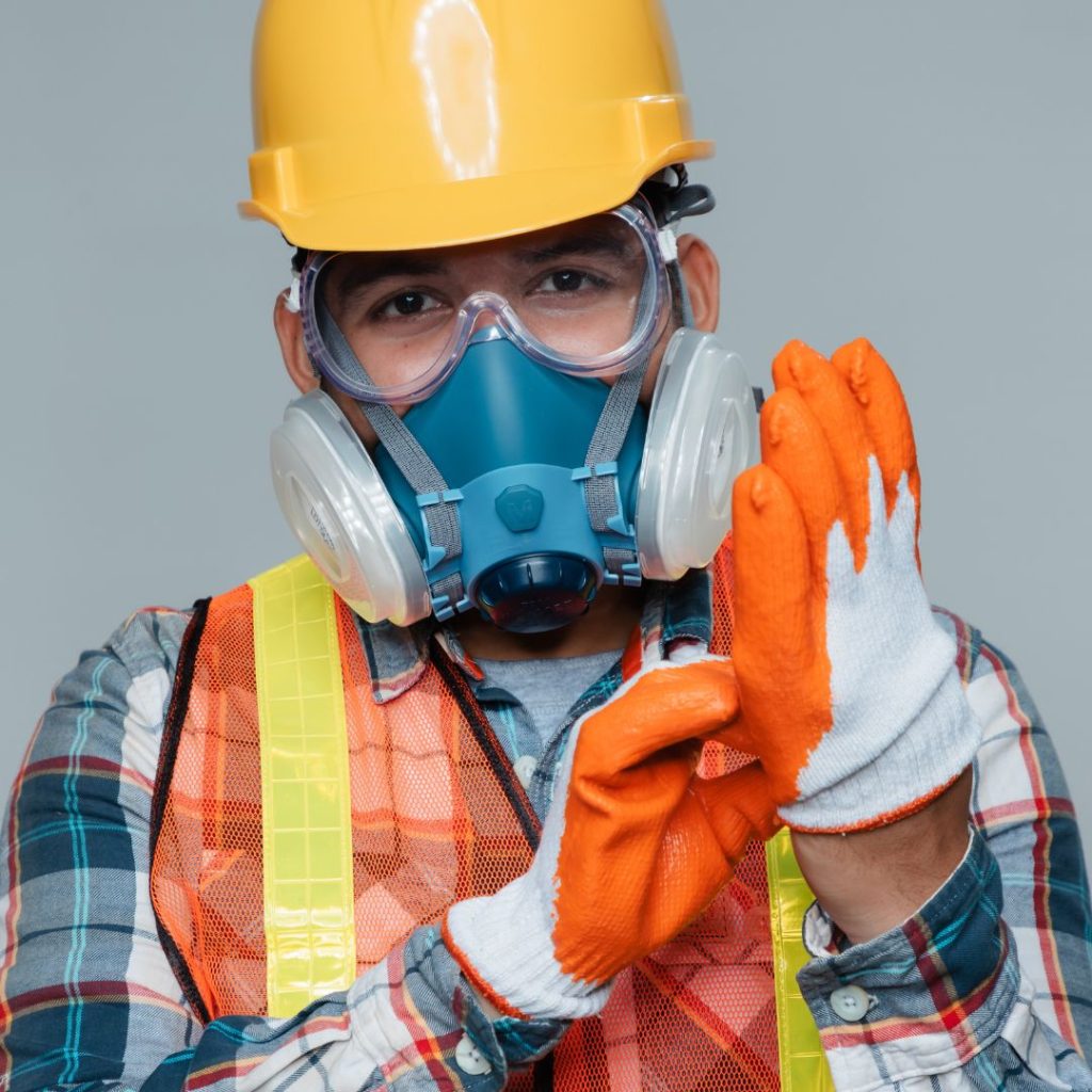 A man wearing adequate personal protection equipment.