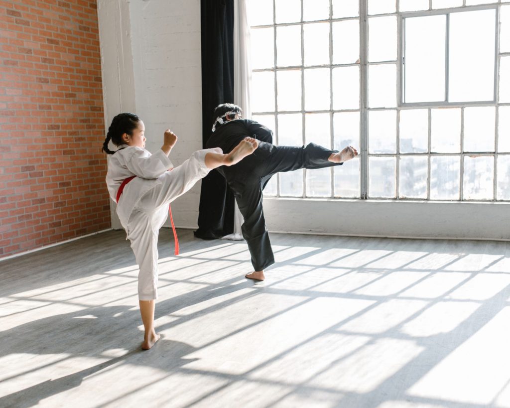 A child training karate fundamentals.